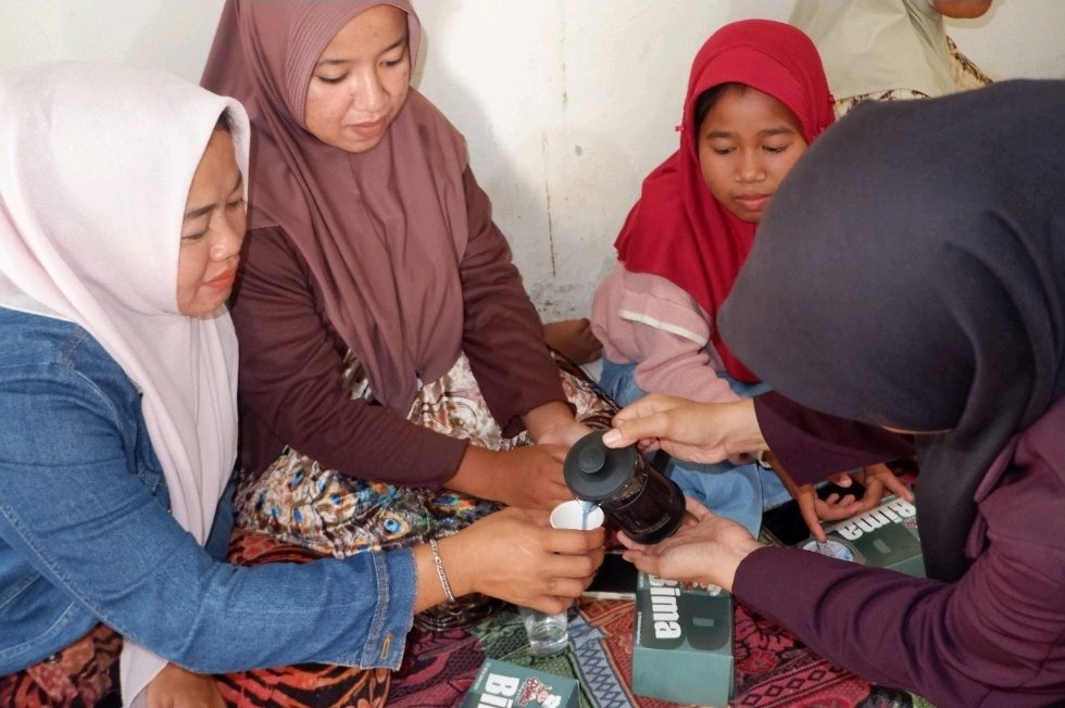Participants checking each preparation and running simple sensory tests.